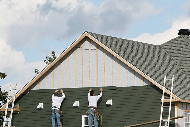 Professional Vinyl Siding technician working in Midland, OH